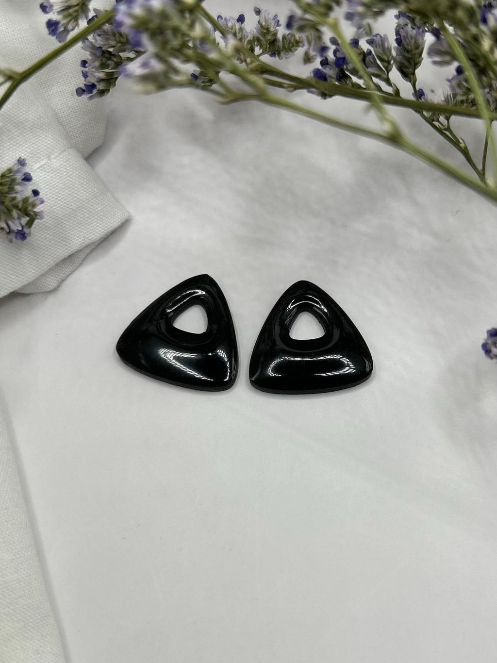 Pampilles triangles noires