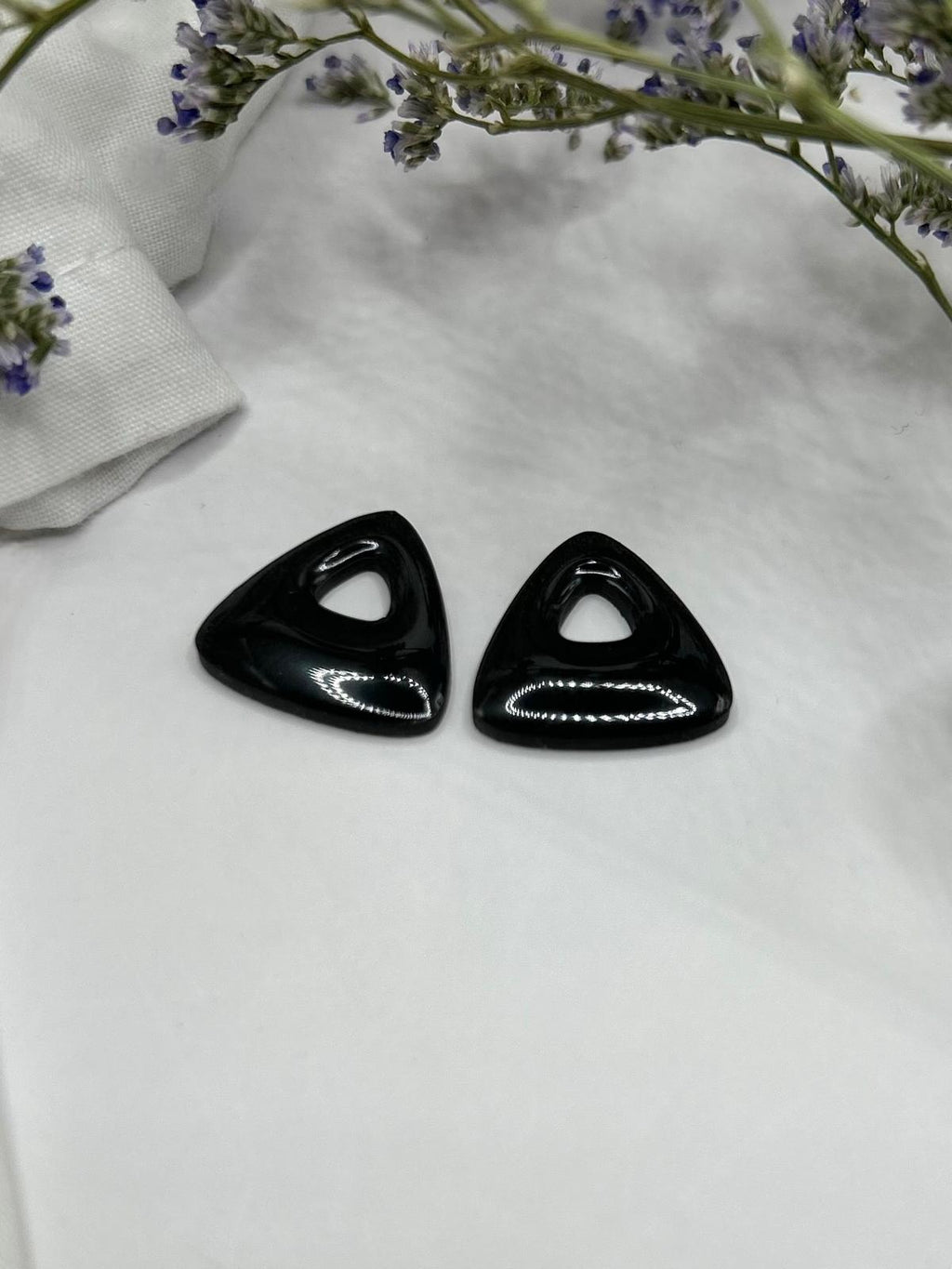 Pampilles triangles noires