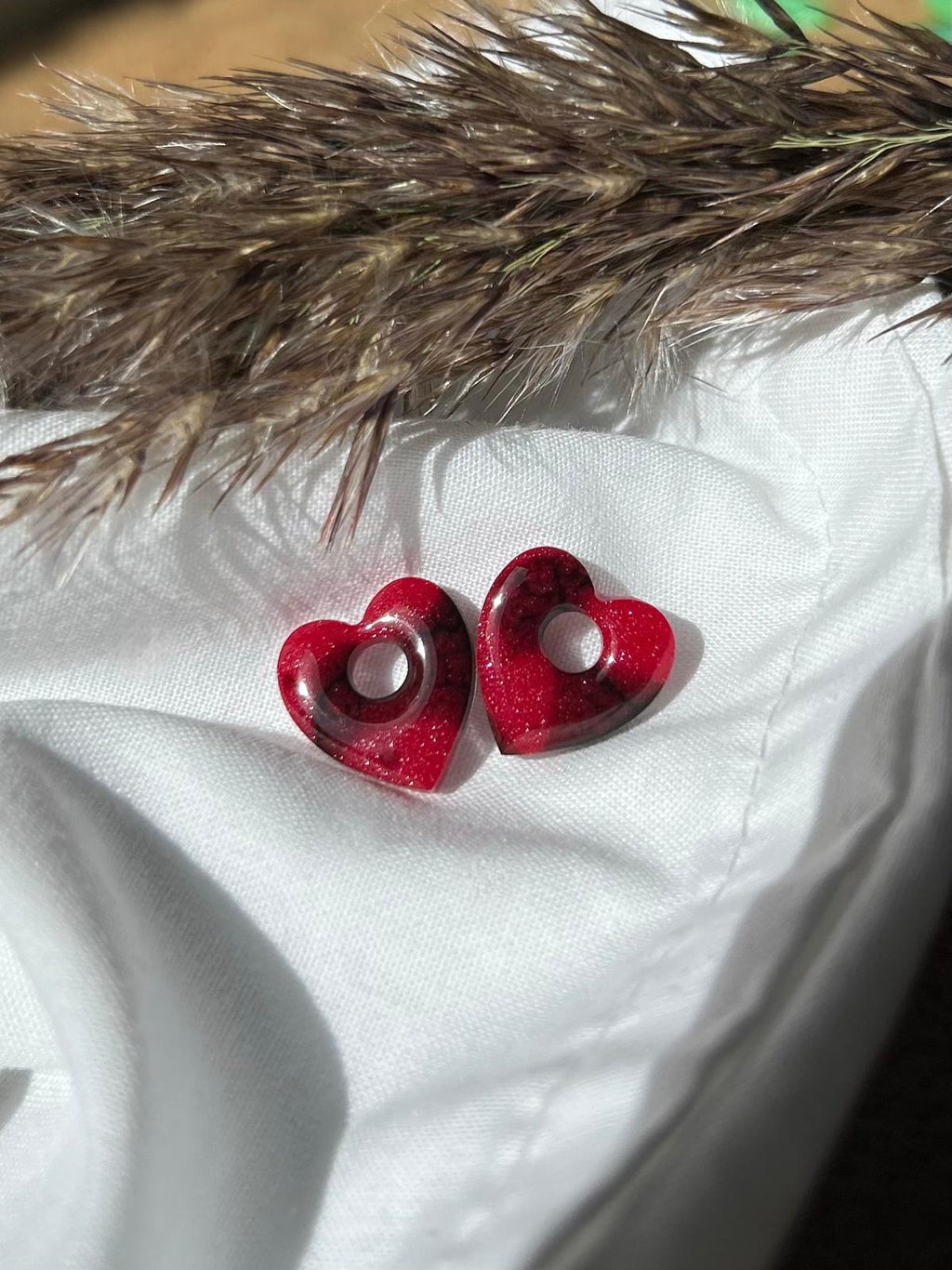 Pampilles coeurs noires et rouges